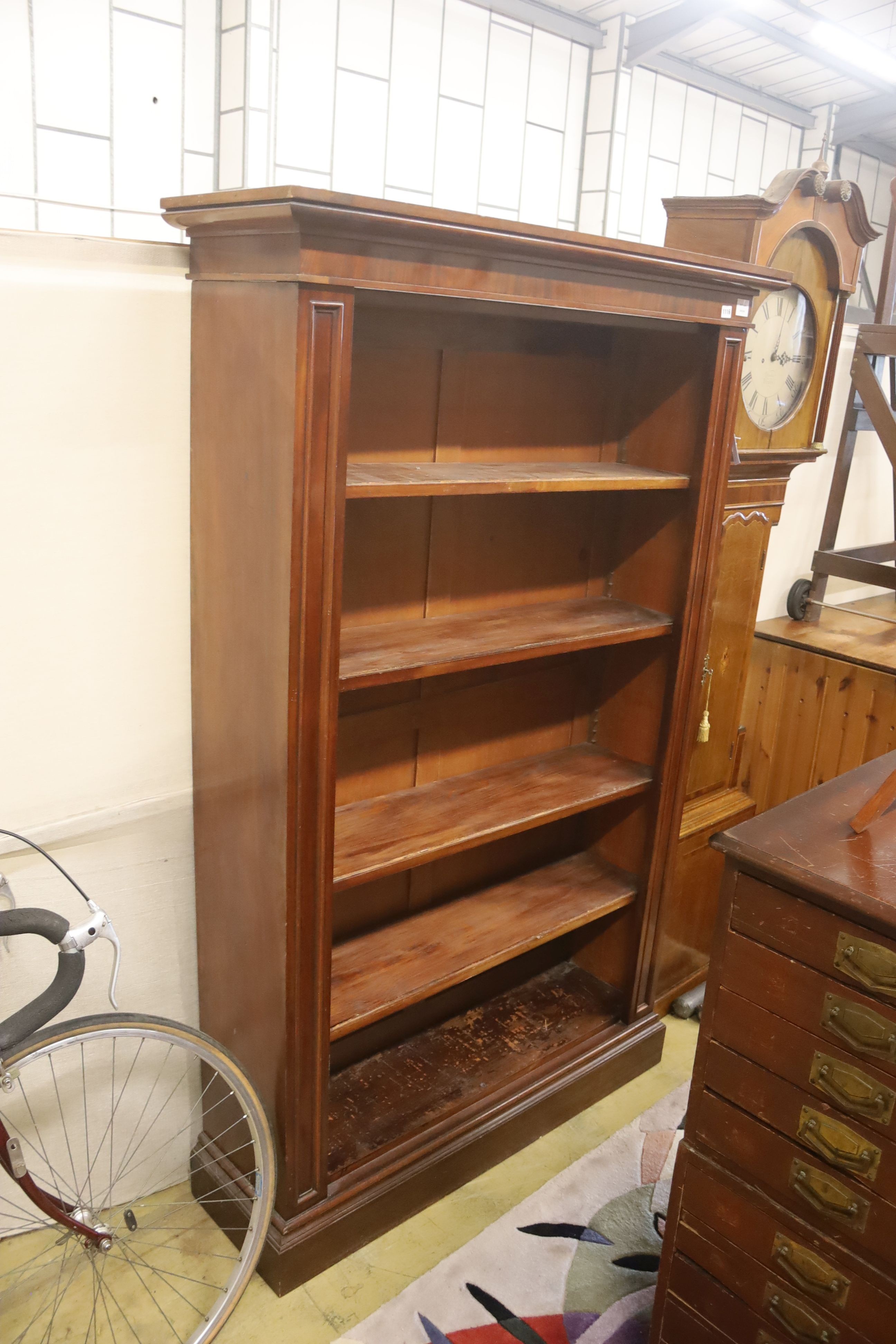 A large late Victorian mahogany open bookcase, length 118cm, depth 36cm, height 187cm